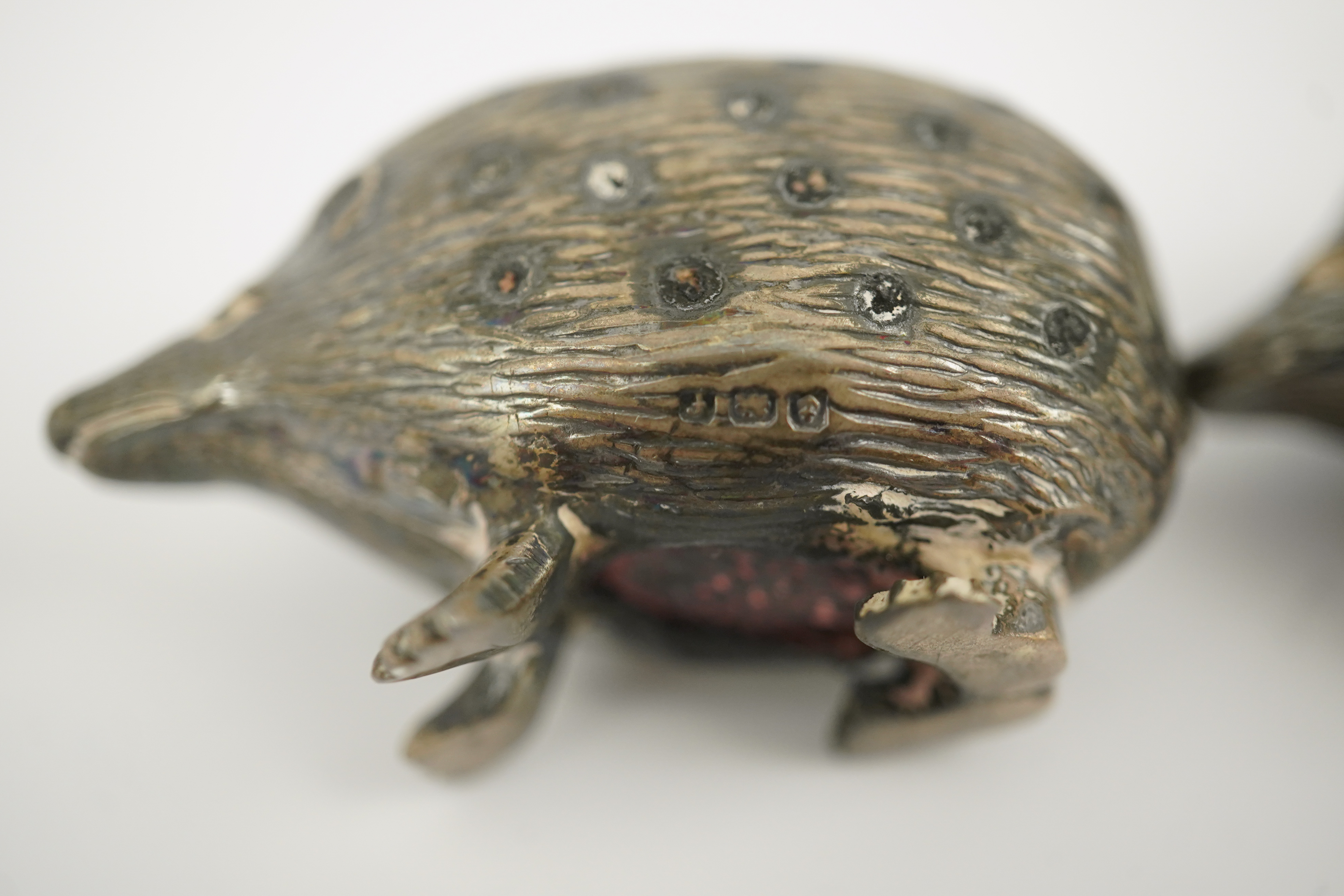 Two Edwardian silver novelty pin cushions, modelled as porcupines